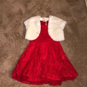 White shaw, and red flowered pattern dress